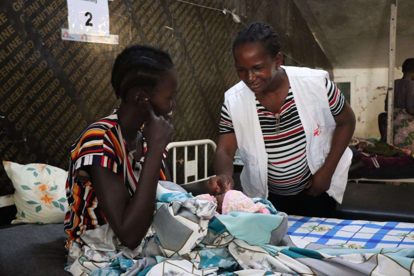 Midwife activity manager provides care in maternity ward of Old Fangak hospital.