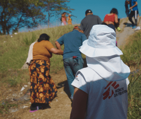 Migrants pass through the town of Huixtla, where MSF carried out a mobile clinic.