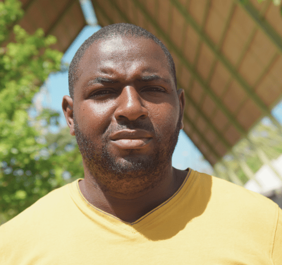 Mamadou, left Guinea with his wife and daughter, escaping threats to his life. 